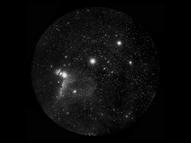 Nébuleuse de la flamme - NGC2024, tête de cheval - Barnard 33 - et nébuleuse en arrière plan - IC434. Image réalisée avec un télescope de Schmidt